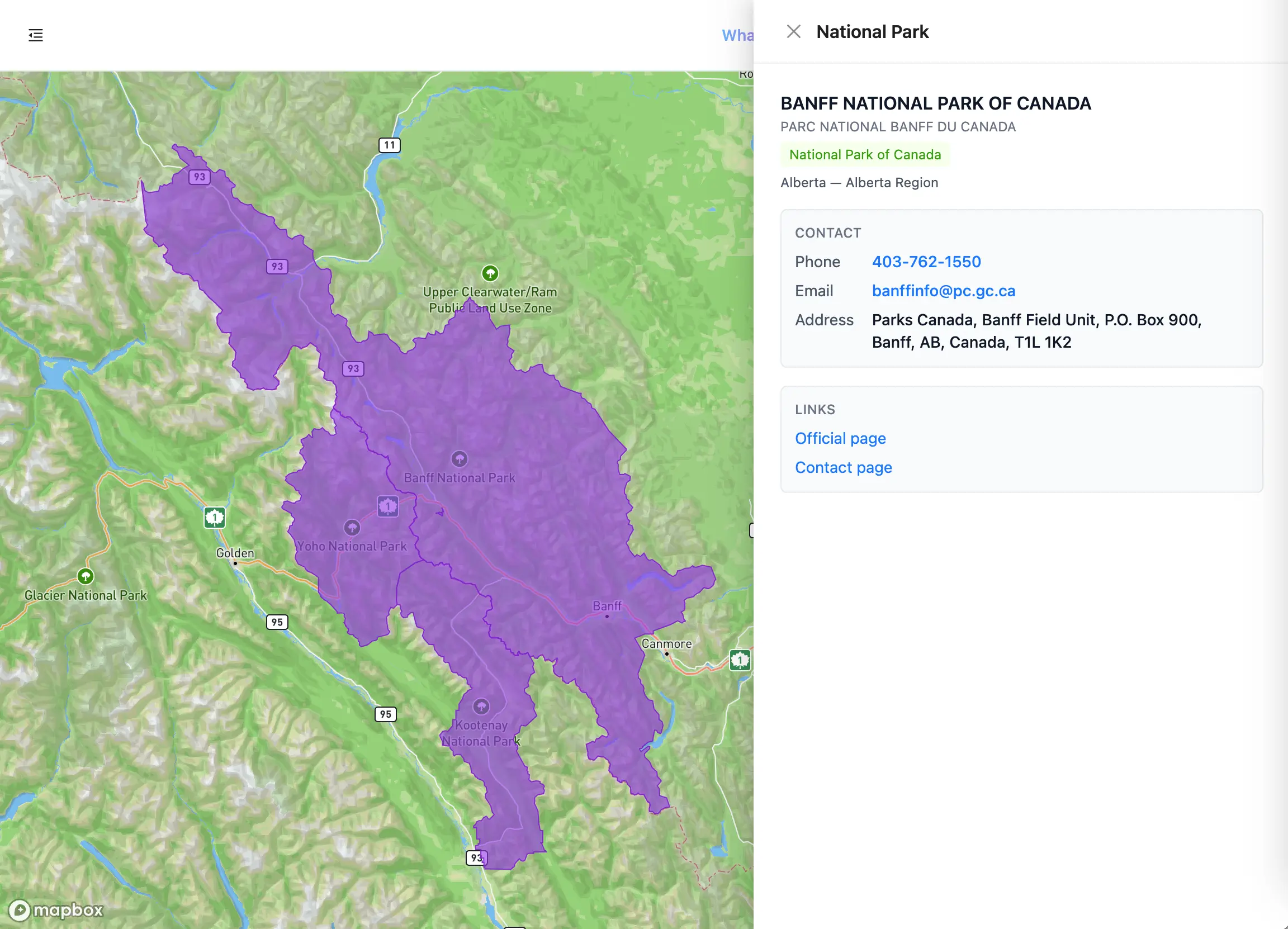 Une limite de parc national en violet couvrant une vaste aire protégée sur la carte